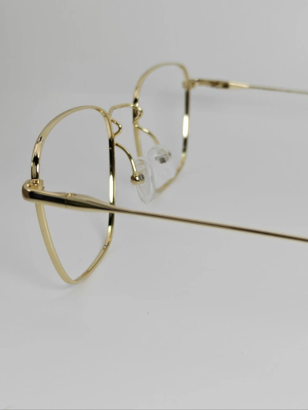 Future. Titanium Eyeglass Temple Arm in Gold. Minimalist Nose Pads.